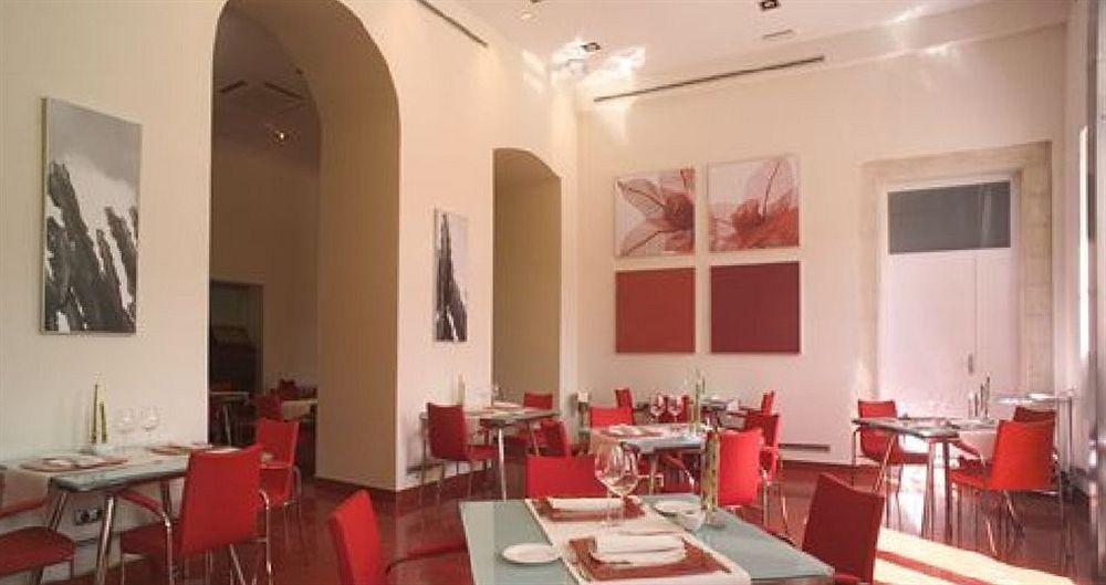 ホテル パラシオ ガルベイ ヘレス レストラン 写真